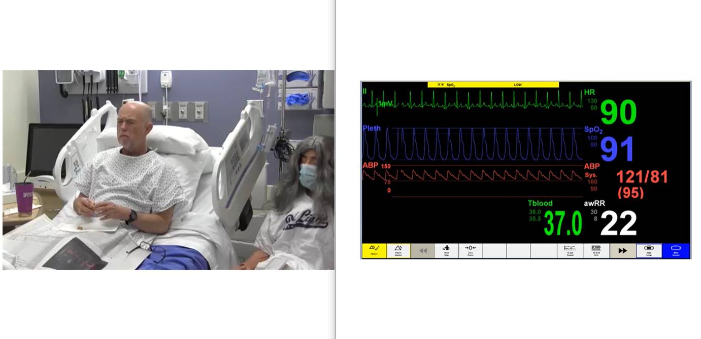 On the left-hand side, a standard patient was sitting in an upright position on a hospital bed. On the right-hand side, the monitor displays the "simulated" vitals of the standard patient mimicking normal and abnormal function